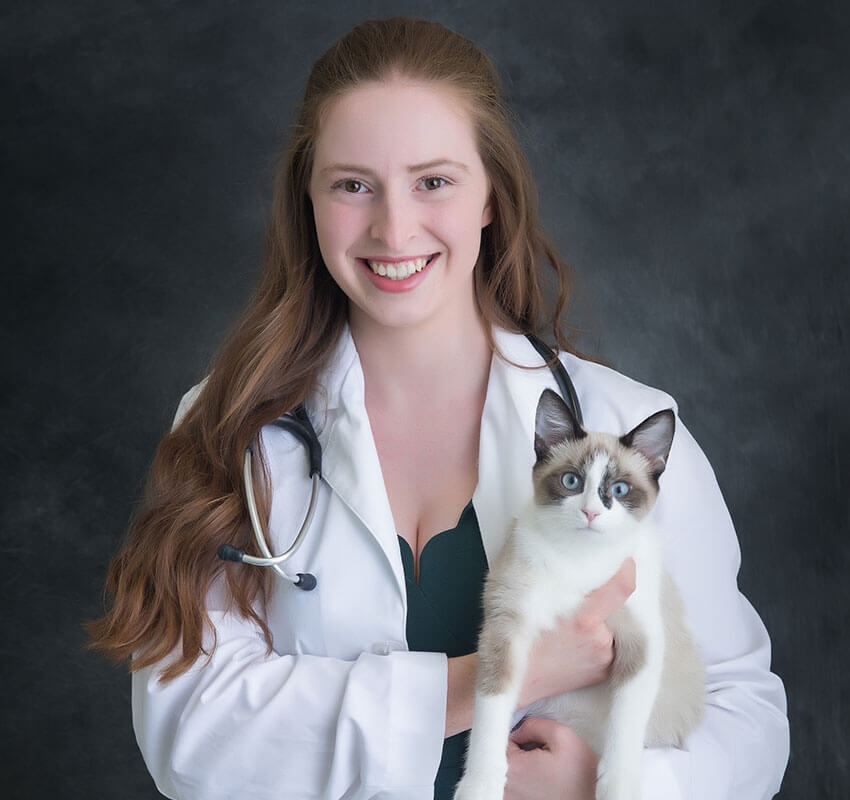 woman vet with cat