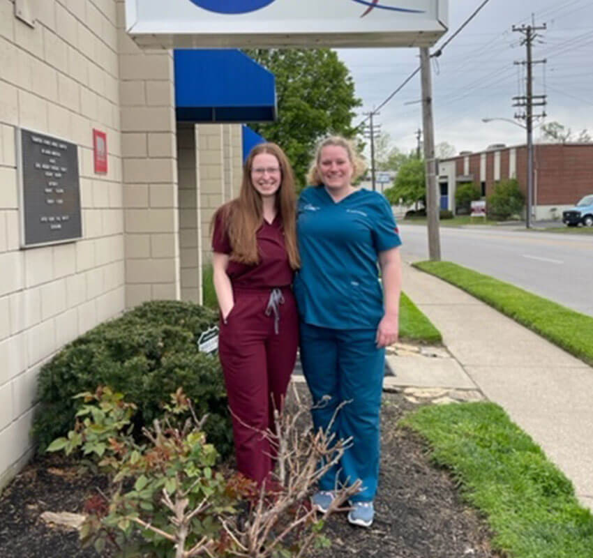 staff standing outside the clinic