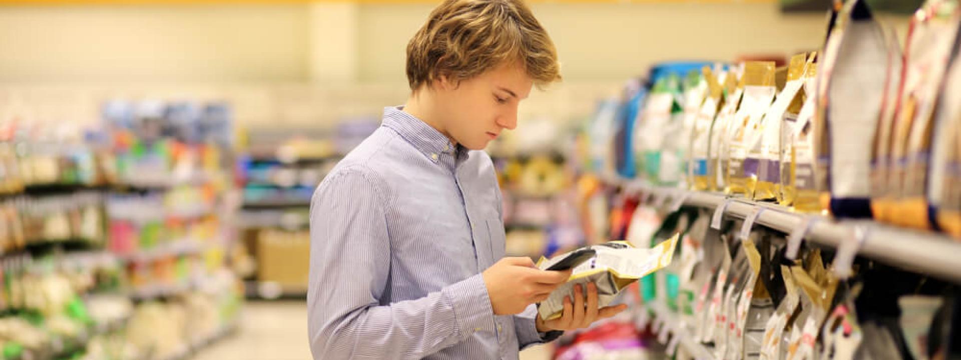 man reading labels